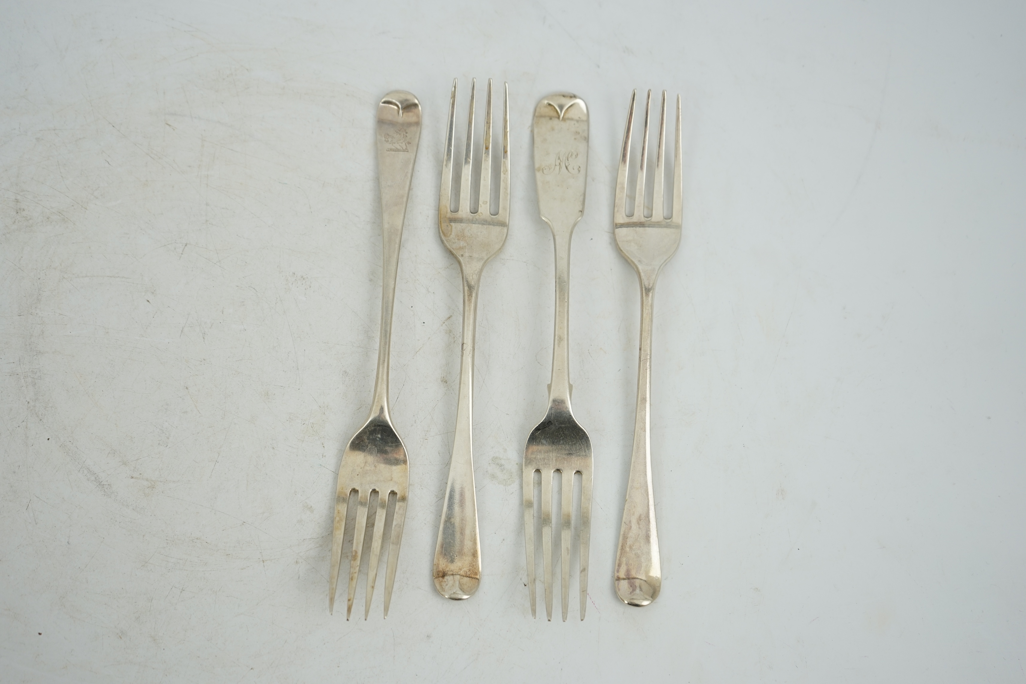 A harlequin collection of thirty four mainly 19th century silver old English pattern dessert forks, various dates and makers, together with five similar fiddle pattern dessert forks and one Kings pattern dessert fork